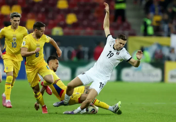 Dinamična fudbalska utakmica između reprezentacija Bosne i Hrvatske na stadionu u BiH.