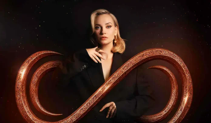 Stilizirana žena sa zlatnim odjevnim predmetima i kozmetikom u pozadini zvijezda, simbol beskonačnosti i modernog luksuza.